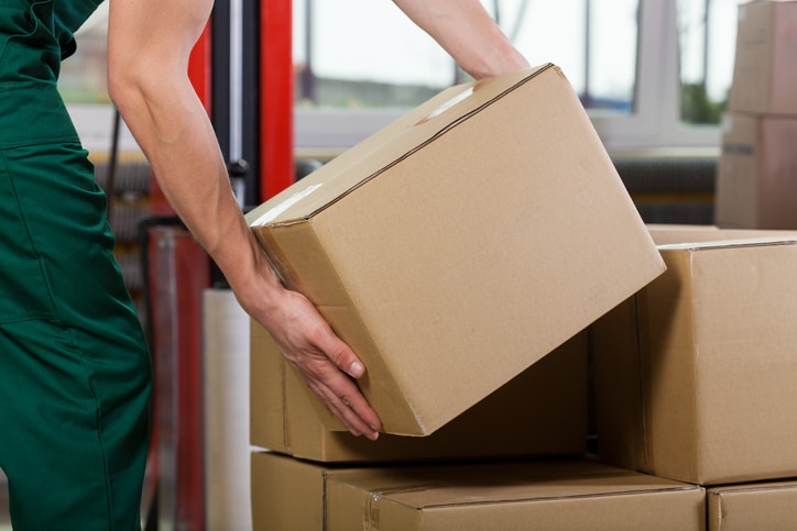Man lifting box using correct Manual Handling technique