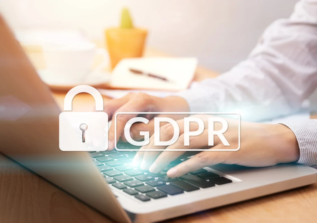 A worker using a laptop in a GDPR compliant manner